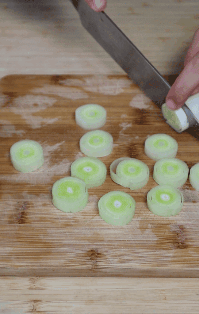 leeks being cut into rounds