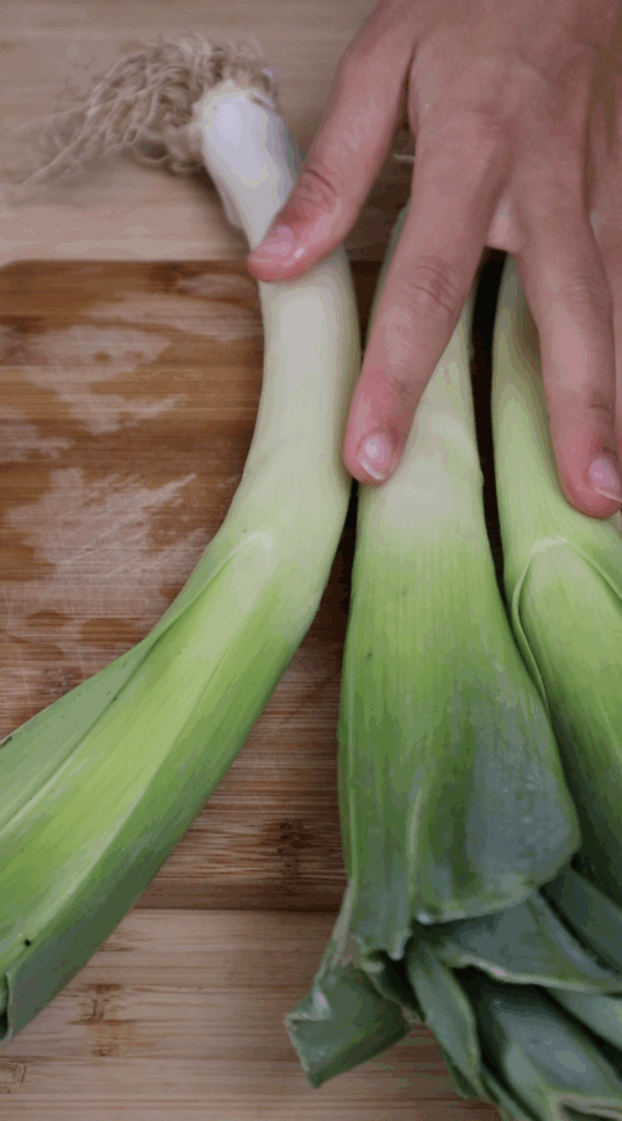 leeks on a chopping board