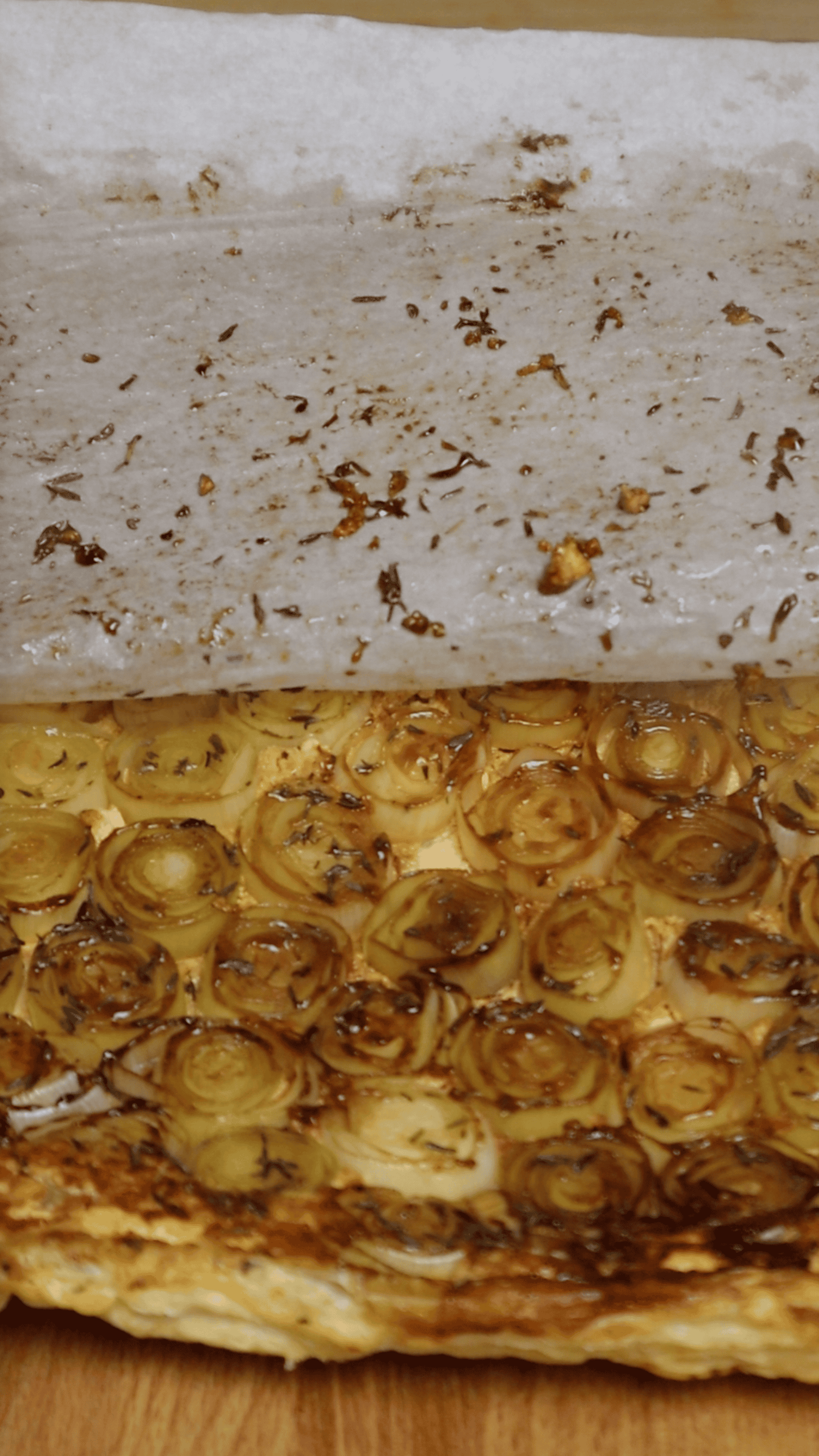caramelized leeks tart revelead from lifting baking paper